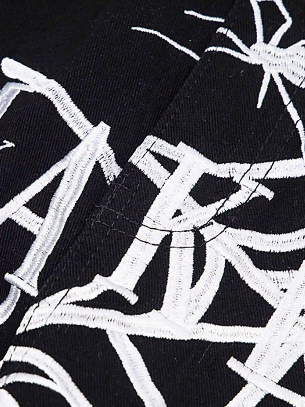 Jean brodé Spider de Disguisen American High Street