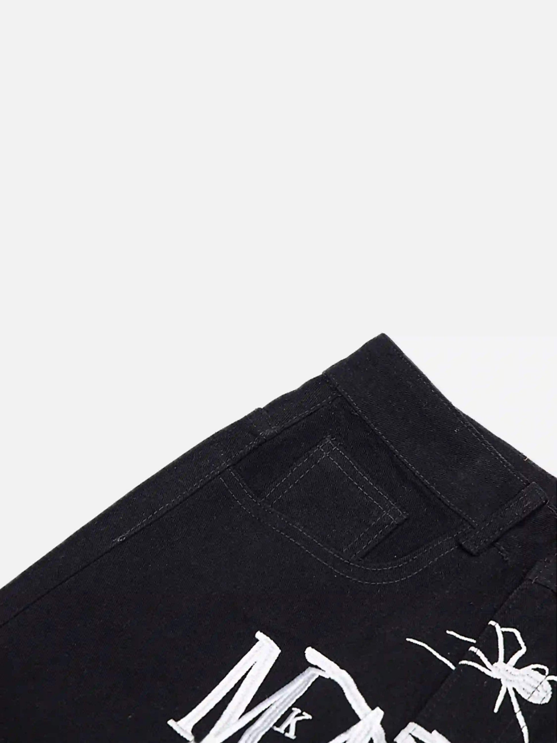 Jean brodé Spider de Disguisen American High Street