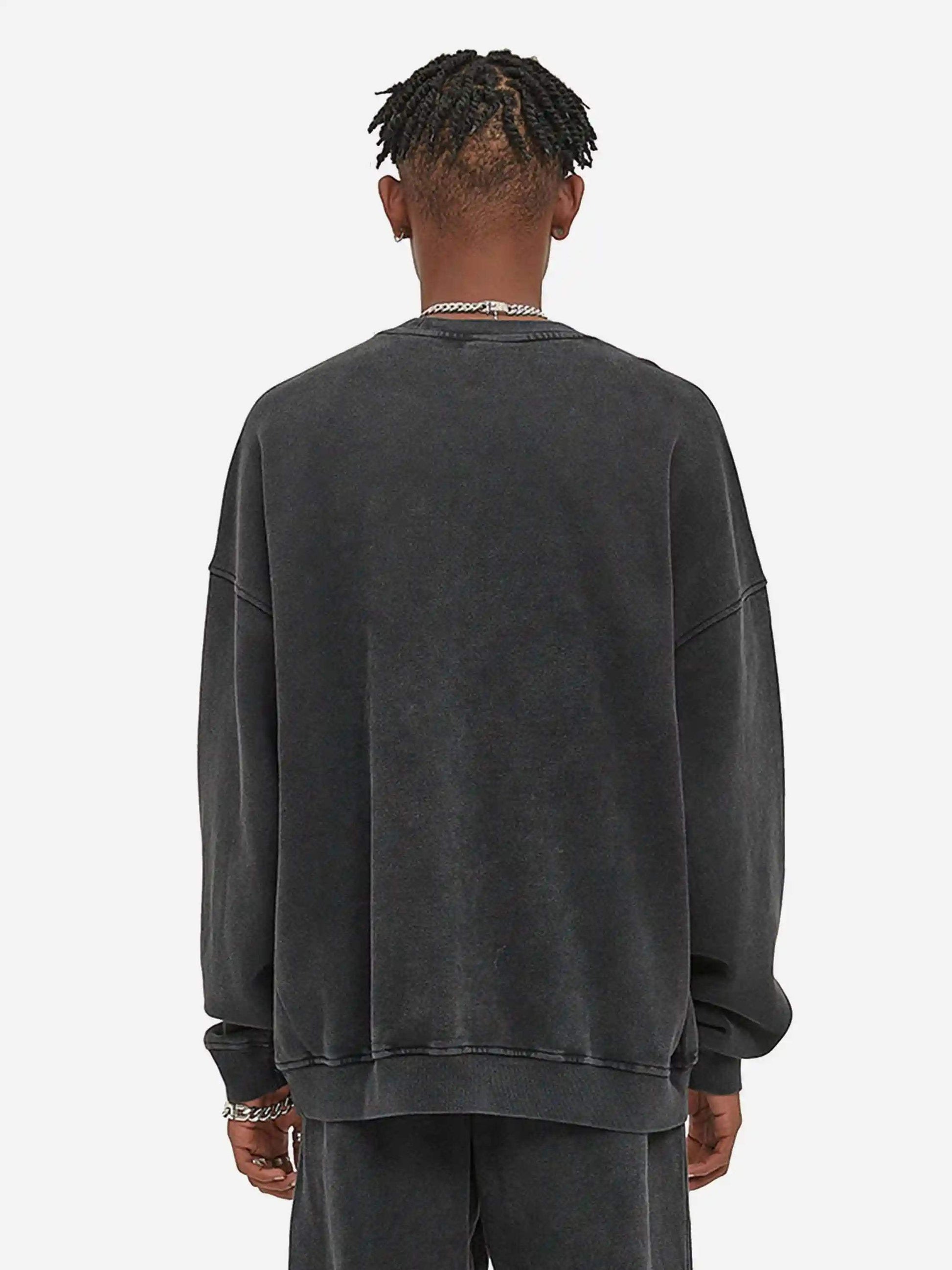 Disguisen Batik Distressed Loose Round Neck Sweatshirt