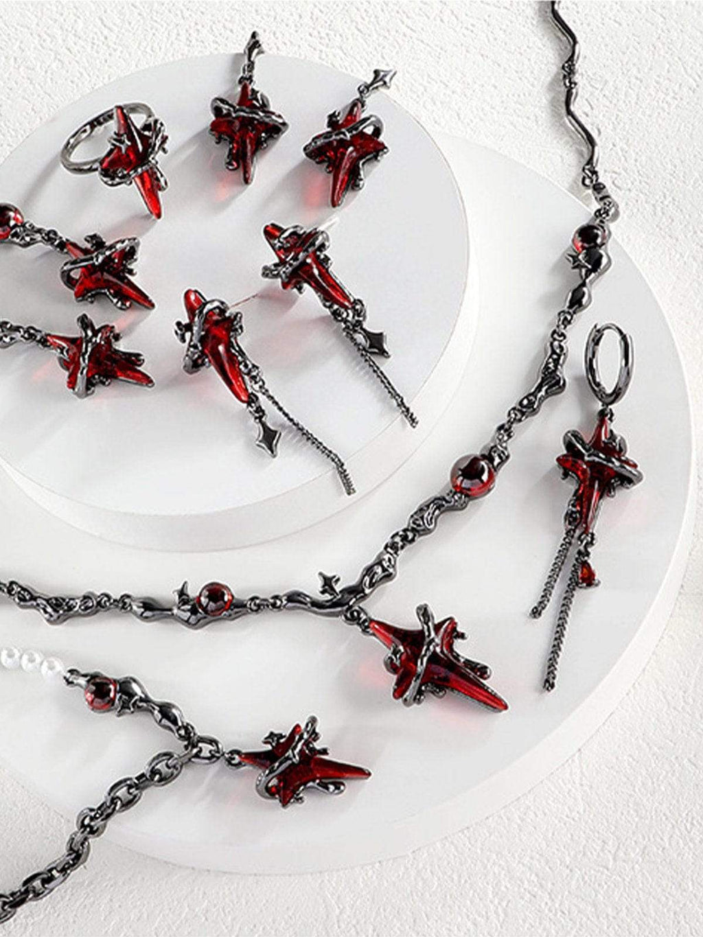 Disguisen Artificial Ruby Four-Pointed Star Earring